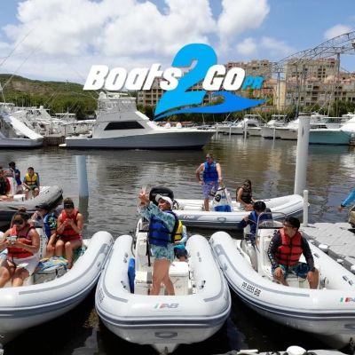 a group of people on a boat in the water