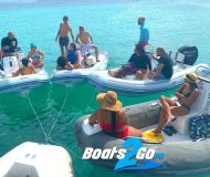 a group of people on a boat in the water