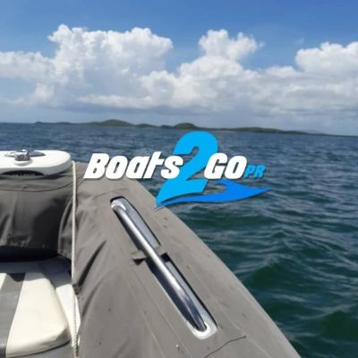 a boat parked next to a body of water