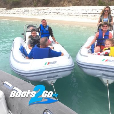 a group of people on a boat in the water