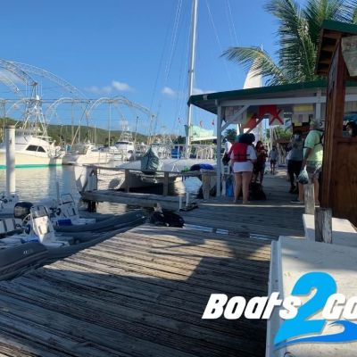 a boat sitting on top of a pier