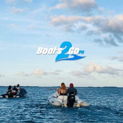 a group of people in a large body of water