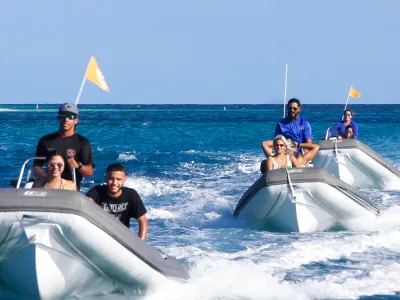 a man flying through the air over a body of water