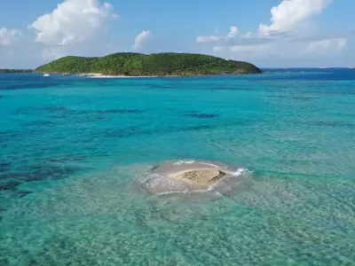 an island in the middle of a body of water
