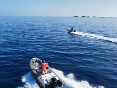 a small boat in a body of water